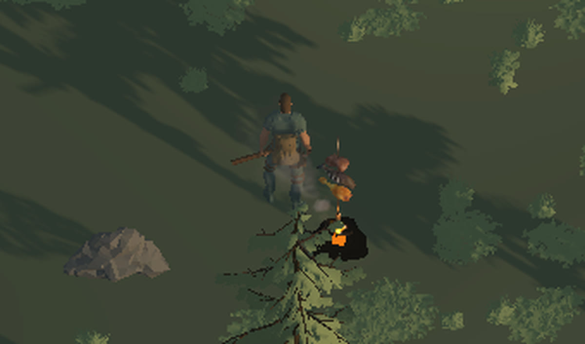 Rabbit meat on a green stick over a small fire